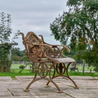 Side view of Rustic Cast Iron "Dog" Bench