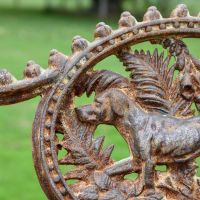 Close up of rustic finish on "Dog" motif