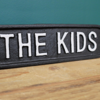 Close-up of the White Lettering on the Black Background