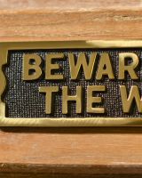 Close up Of Be Aware of the wife - Gate sign