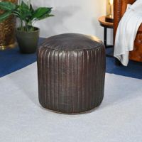 Round Goat Leather Pouffe in Situ