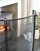 Close-Up of Black "Fortress" Curved Three Fold Fireguard