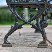 Close up of Cast Iron decorative legs on "Quatrefoil" Garden Bench  Close up of Cast Iron decorative legs on "Quatrefoil" Garden Bench