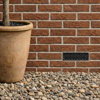 black_cast_iron_keyhole_pattern_air_brick_9_x_3_2_ installed on a new home