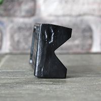 Side View of the Black Cast Iron "Keyhole Pattern" Air Brick 