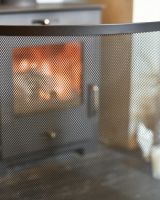Close Up Of Black Contemporary Curved Single Panel Fire Guard Mesh