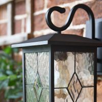 Black Contemporary "Searchlight" Outdoor Rectangular Top Fix Wall Lantern in Situ
