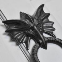 Close-Up of Black Dragon Head Door Knocker