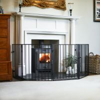 Black Traditional Five Panel Nursery Guard in Front of the Fire Place Black Traditional Five Panel Nursery Guard in Front of the Fire Place