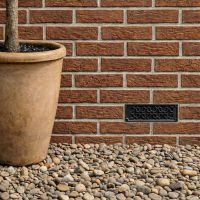 black_flower_flat_air_brick_coverinstalled on a new home