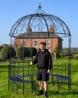 "Kensington" Domed Wrought Iron Gazebo in a Midnight Black Finish with a Man Stood in Shot for Scale