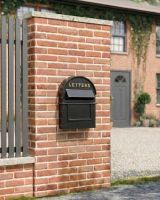 black_gold_grosvenor_telescopic_post_and_parcel_box_on_a_wall installed on a new home black_gold_grosvenor_telescopic_post_and_parcel_box_on_a_wall installed on a new home