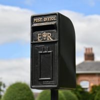 Close-Up of Black & Gold Newland Elizabeth Regina Post Box with Stand Close-Up of Black & Gold Newland Elizabeth Regina Post Box with Stand