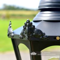 Close-up of the Decorative Ornate Wings on the Lantern"s Lid