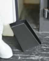 Close Up Of Black Hooked Fireside Shovel Base Close Up Of Black Hooked Fireside Shovel Base