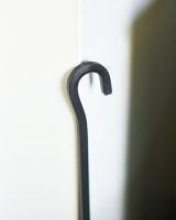 Close Up Of Black Hooked Fireside Shovel Hooked Handle Close Up Of Black Hooked Fireside Shovel Hooked Handle