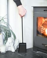 Scale Shot Of Black Hooked Fireside Shovel Scale Shot Of Black Hooked Fireside Shovel