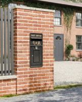 black_king_george_rex_post_box_front installed on a new home