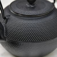 Close-Up of Japanese Dotted Design on Cast Iron Teapot