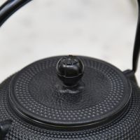 Close-Up of Closed Lid on Black "Kyusu" Cast Iron Japanese Teapot with Handle