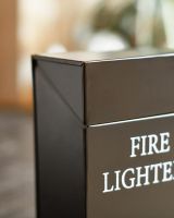 Close Up Of Black Metal "Fire Lighters" Holder Close Up Of Black Metal "Fire Lighters" Holder