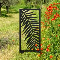 Black Palm Leaf Garden Screen Next To Poppies