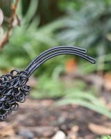 Close-Up of Tail on Black Rooster Wire Sculpture