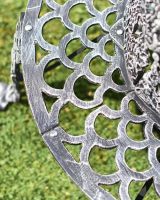 Close-Up of Seat Pattern on Black & Silver Ornate Tree Seat Close-Up of Seat Pattern on Black & Silver Ornate Tree Seat