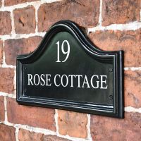 Sid View of the Black Traditional House Name Sign Flush on a Wall