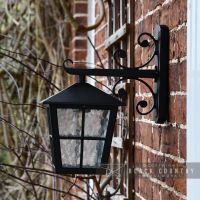 Side View of the Black Traditional Top Fix Wall Lantern with Ornate Bracket