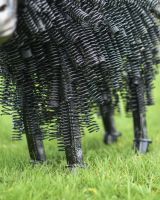 Close-Up of Freestanding Black Twisted Metal Garden Sculpture - Recycled Outdoor Ornament