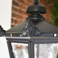 Ornate Finials on the Lid of the Traditional Chain Hanging Lantern Ornate Finials on the Lid of the Traditional Chain Hanging Lantern