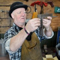 Blacksmith Joist Hangers being Measured in the Workshop