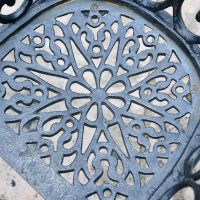 Close up of design on Aged Black Scroll Heart Chair Close up of design on Aged Black Scroll Heart Chair