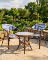 The "Draycott" 2-Seater Rattan Outdoor Dining Set in Situ in the Garden