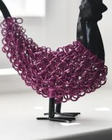 Close up of body detail on cockerel sculpture Close up of body detail on cockerel sculpture