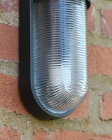 Close Up Of The Ribbed Glass On The Wall Light