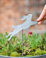 Bounding Hare Artistic Plant Pot Spike - Set of Two with hand in shot for scale