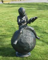 "Boy Reading on Top of the World" Sculpture in Situ in the Garden