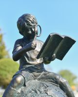 Close-up of the "Boy Reading on Top of the World" Sculpture