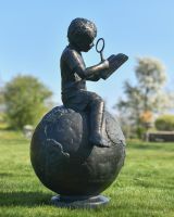 View of the Side of the "Boy Reading on Top of the World" Sculpture