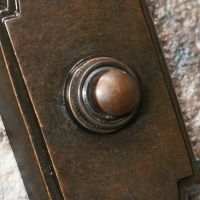 Detailed image of push button for door bell chime