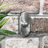 Front door bell switch finished in satin chrome Front door bell switch finished in satin chrome