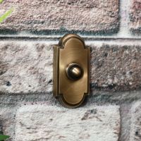 Classic Designed door Bell on Brick wall finished in antique bronze