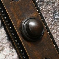 close up of door bell button