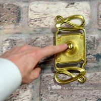 “Maytree Avenue” Polished Brass Swirl Pattern Bell Push to Scale