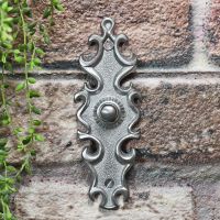 Satin Chrome Door Bell on brick wall Satin Chrome Door Bell on brick wall