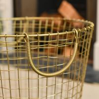 Carry Handles on the Brass Plated Wire Log Basket Carry Handles on the Brass Plated Wire Log Basket