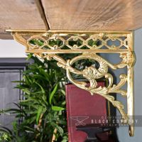 Side View of the Polished Brass Serpent Design Shelf Bracket