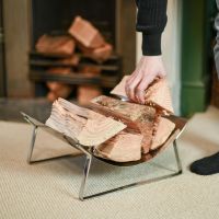 Bright Chrome Curved Contemporary Log Holder to Scale Bright Chrome Curved Contemporary Log Holder to Scale